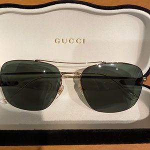 Gucci men’s sunglasses with velvet case